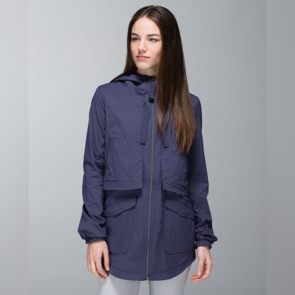 This is a Lululemon Yogi Anorak jacket in cadet blue.
